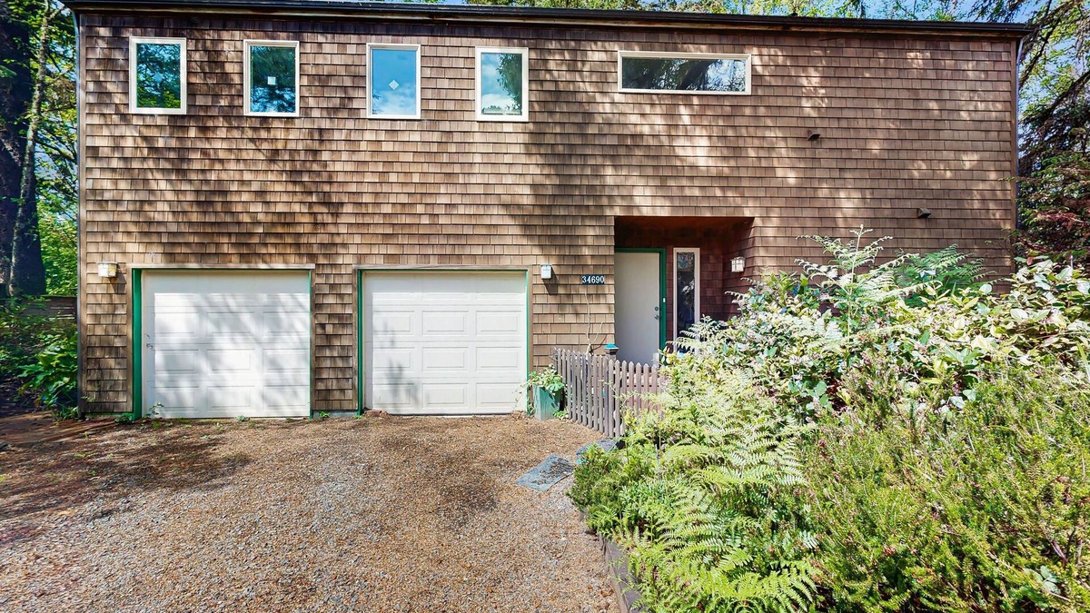 Manzanita House | Forest-view home w/fireplace, deck - Walk to the Beach & Golf Course