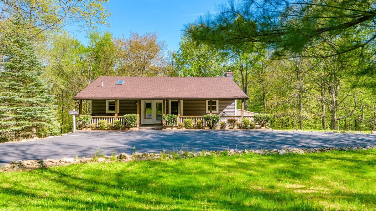 McHenry House | Forest View Home with Wrap-Around Deck - Minutes to the Lake & Wisp Resort