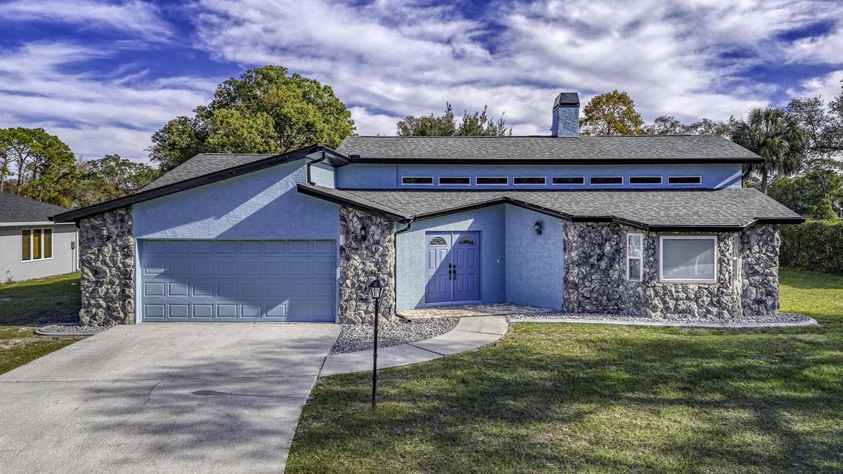 Spring Hill House | Four Beds, three baths, heated pool, and a Golf Course. What more do you need!