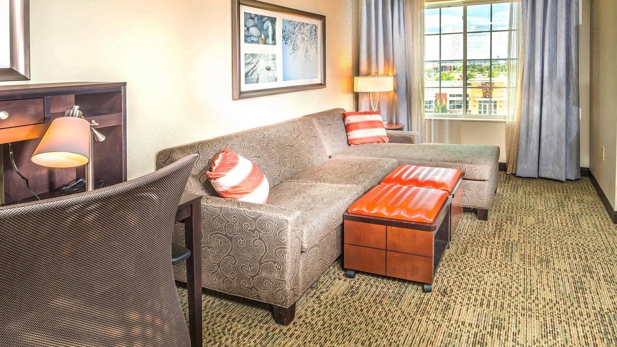 Northfield Apartment | Free Breakfast Buffet & Pool Access. Near University of Colorado Hospital.