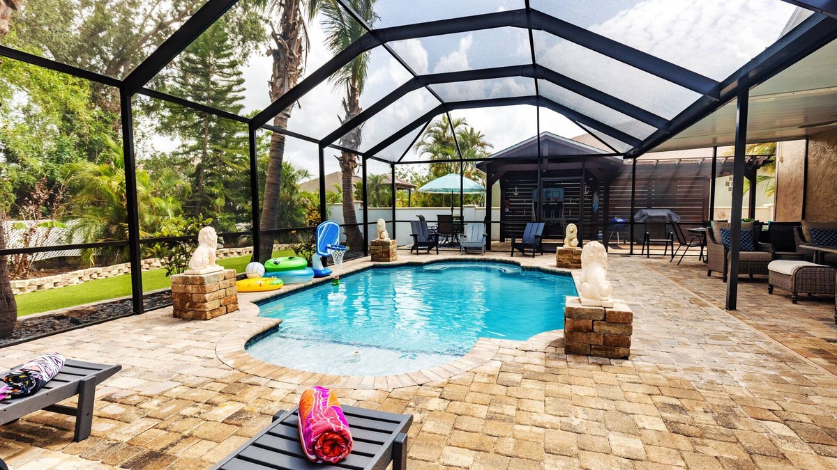 Golf and Sea Village of Apollo Beach House | Free heated pool at Apollo Beach gazebo grill pool table games
