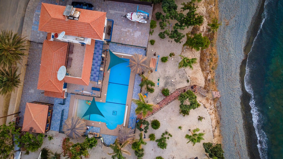 Pomos Villa | Front beach 3 bedrooms VIlla, huge heated swimming pool 15X5X10 meters L shape