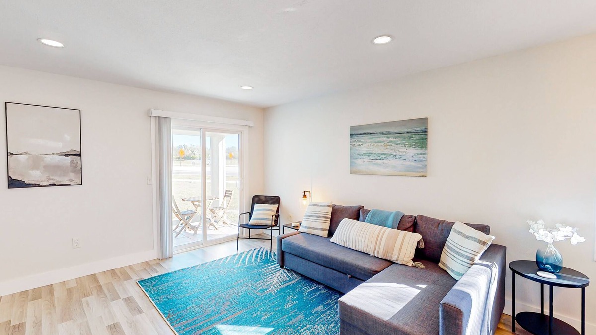 Bay Acres House | Full duplex near beach with renovated interior, screened porches-Dogs ok