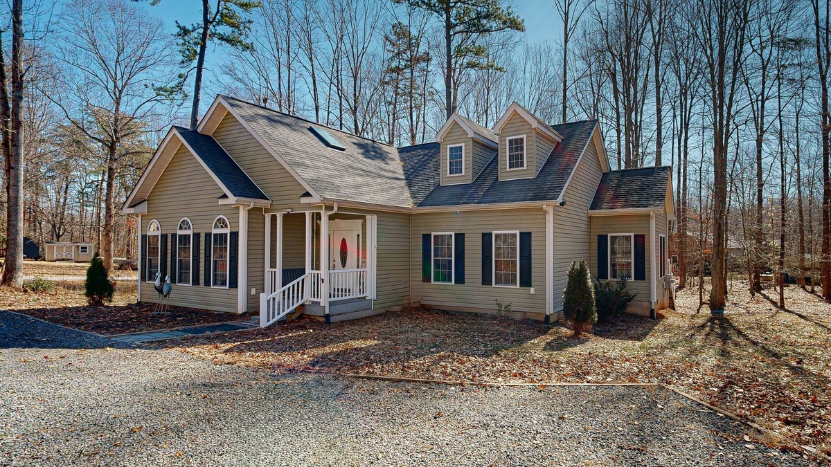 Livingston House | Fun & relaxing getaway with 2 game rooms, fire pits, deck, & more