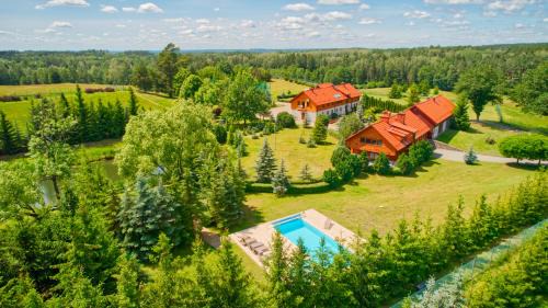 Ryn House | Funaberia -25 hektarowa luksusowa posiadłość z basenem, jacuzzi, sauną, boiskiem wielofunkcyjnym