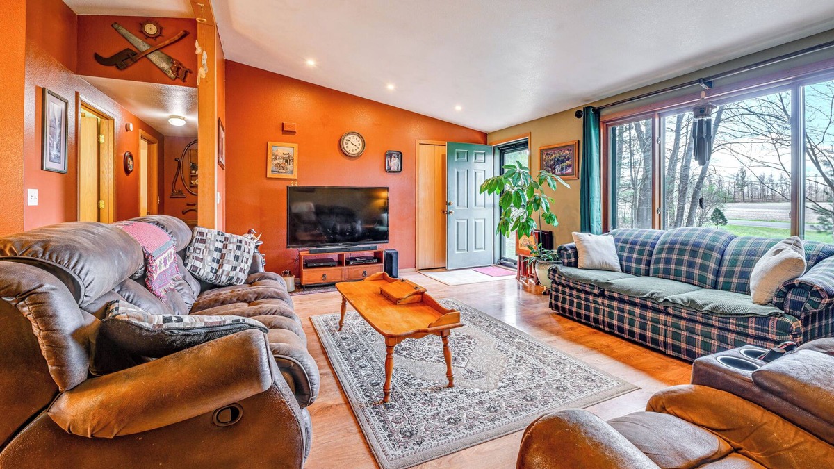 Manawa House | Furnished Deck w/Forested Views: Manawa Home!