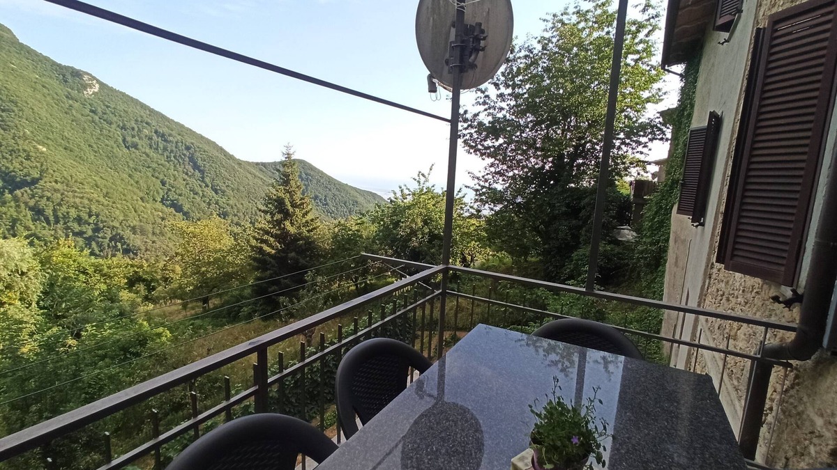 Stazzema House | Gabberi's Breeze is located in a hamlet of houses on a hillside with a sea view