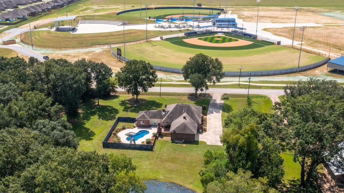 Youngsville House | Gameday Getaway Pool Pond King Bed Sports Complex