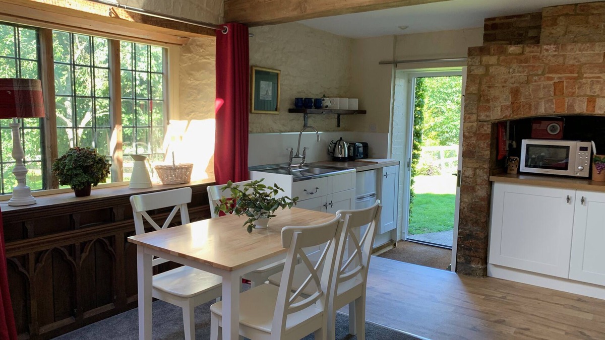 Farthinghoe Cottage | Garden Barn - studio style converted barn with garden