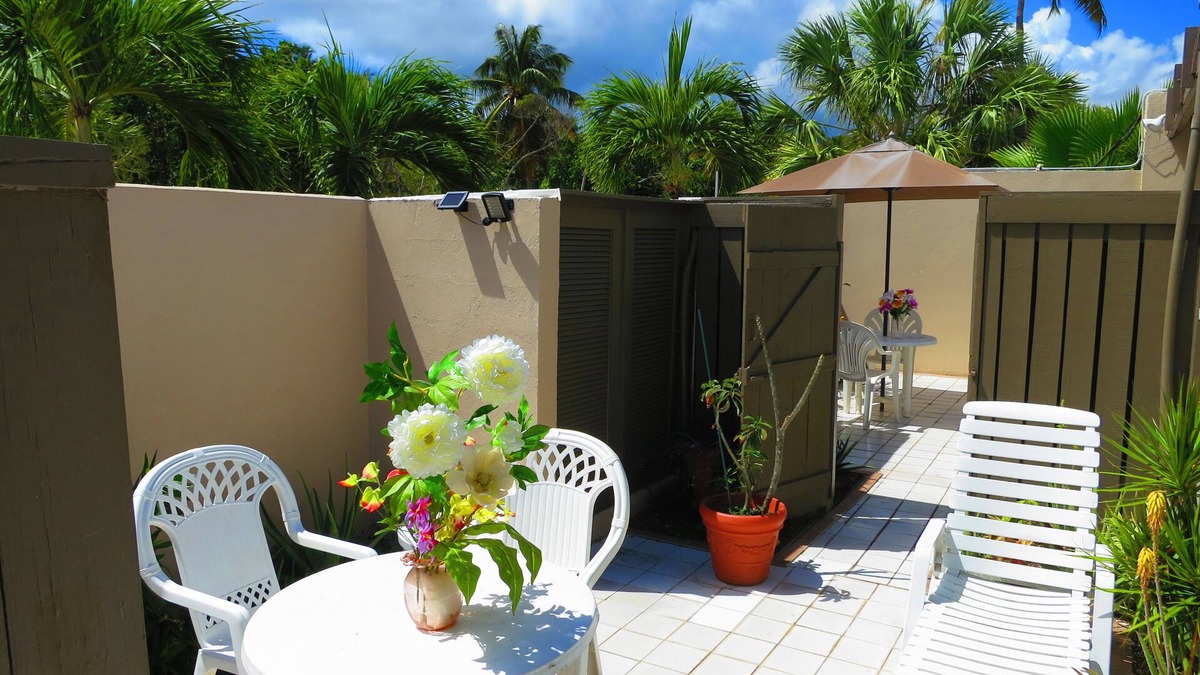 Estate Nisky Villa | Garden Bedroom with 2 Queen Beds and Private Garden Patio.