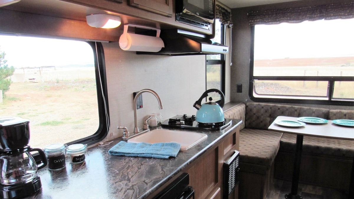 Lewis House | Glamper - Camper set up in a campground or on our property