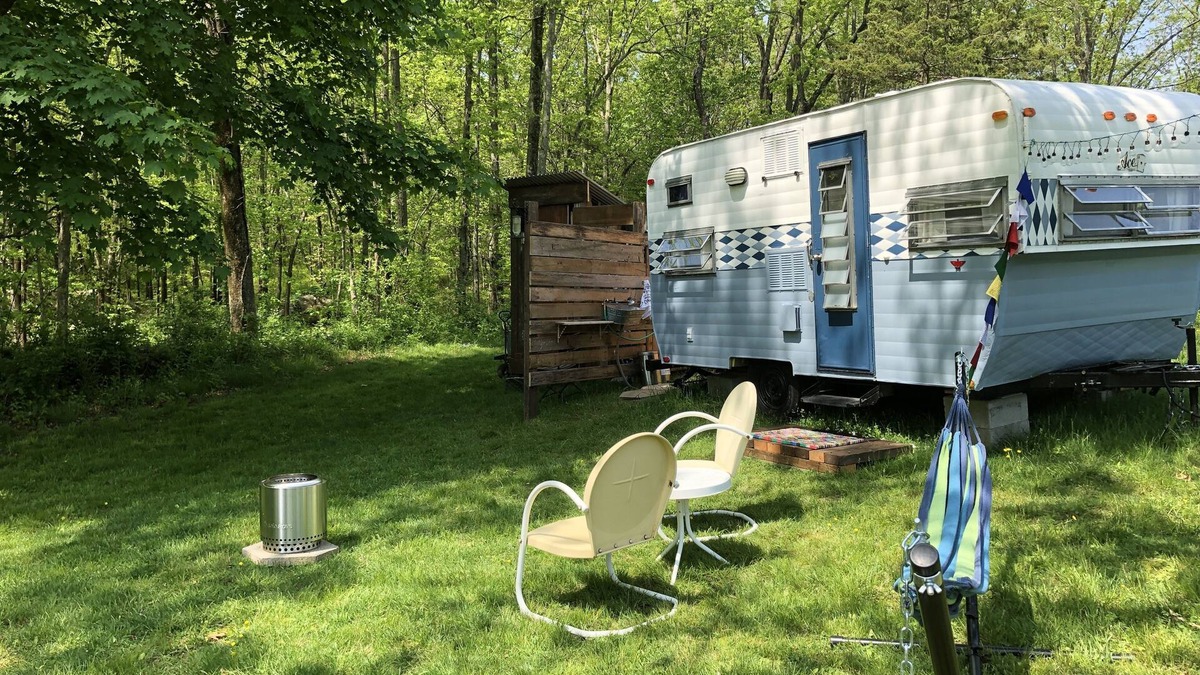 Cranston House | Glamping with sheep in a renovated 1972 Ace camper on 48 acres