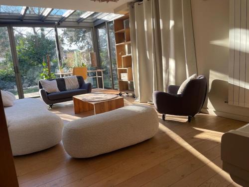 Boutonnet Villa | Glass and wood designer villa with garden in centertown