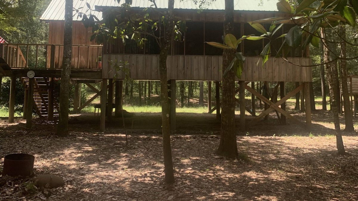 Lucedale Cabin | Go off the beaten path and find "Peace on the River" with family & friends.”