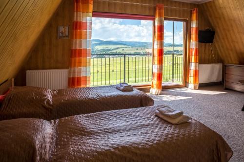 Szczytna Ski Chalet | GolfSPA Golfowa Wioska