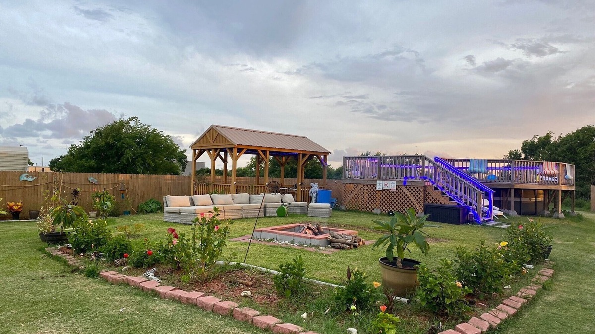 Matagorda Cabin | Gone Coastal is part of a mini resort with pool, bbq area, firepit.
