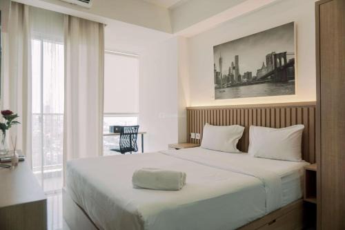 Pinang Apartment | Good and Homey Studio at Pacific Garden Alam Sutera Apartment By Travelio
