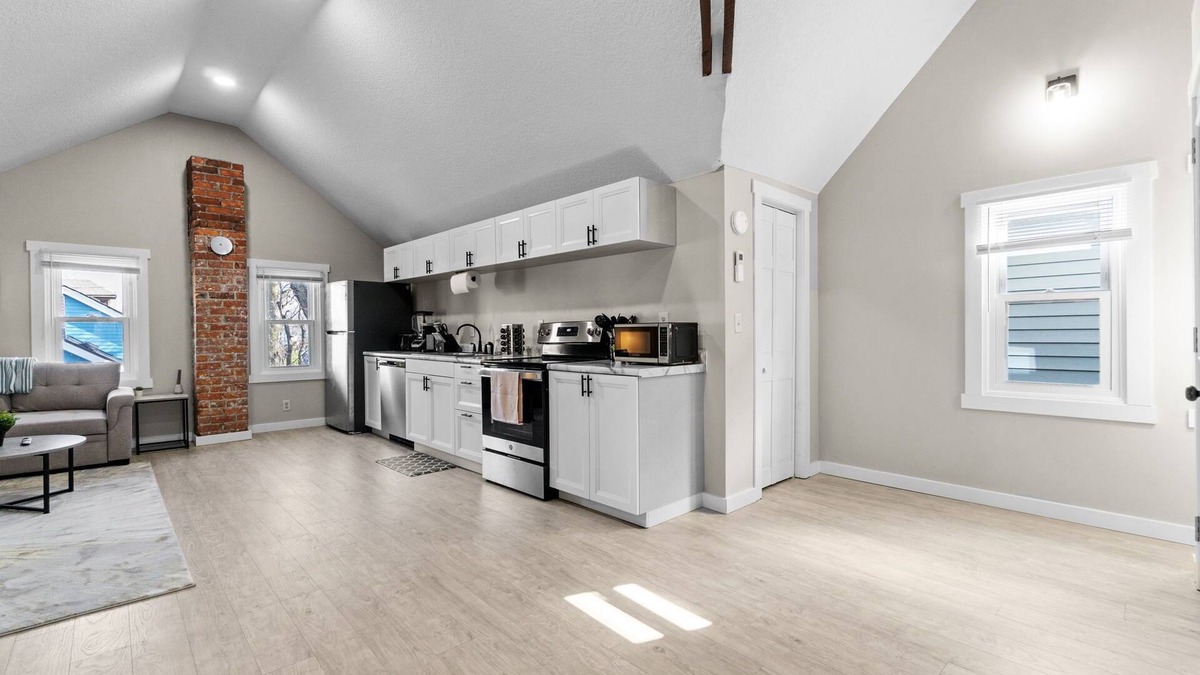 West Central Apartment | Gorg Wooden Beams w/Brick Accents in Downtown Apt