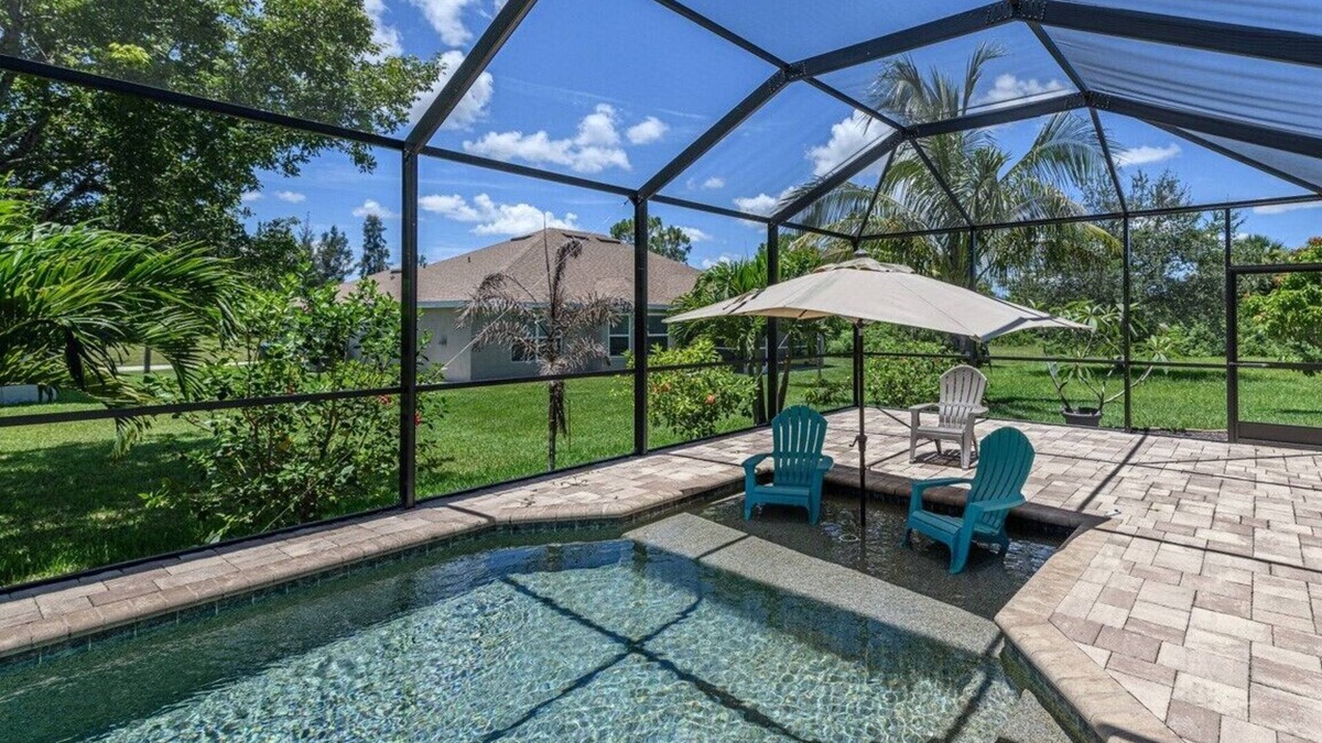 Jacarandas House | Gorgeous Cape Coral Home for a Family Getaway, w/amazing Pool & Waterfall Spa!