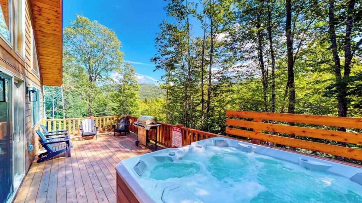 Carrabassett Valley Cabin | Gorgeous dog-friendly cabin with great view, deck, hot tub, & gas fireplace