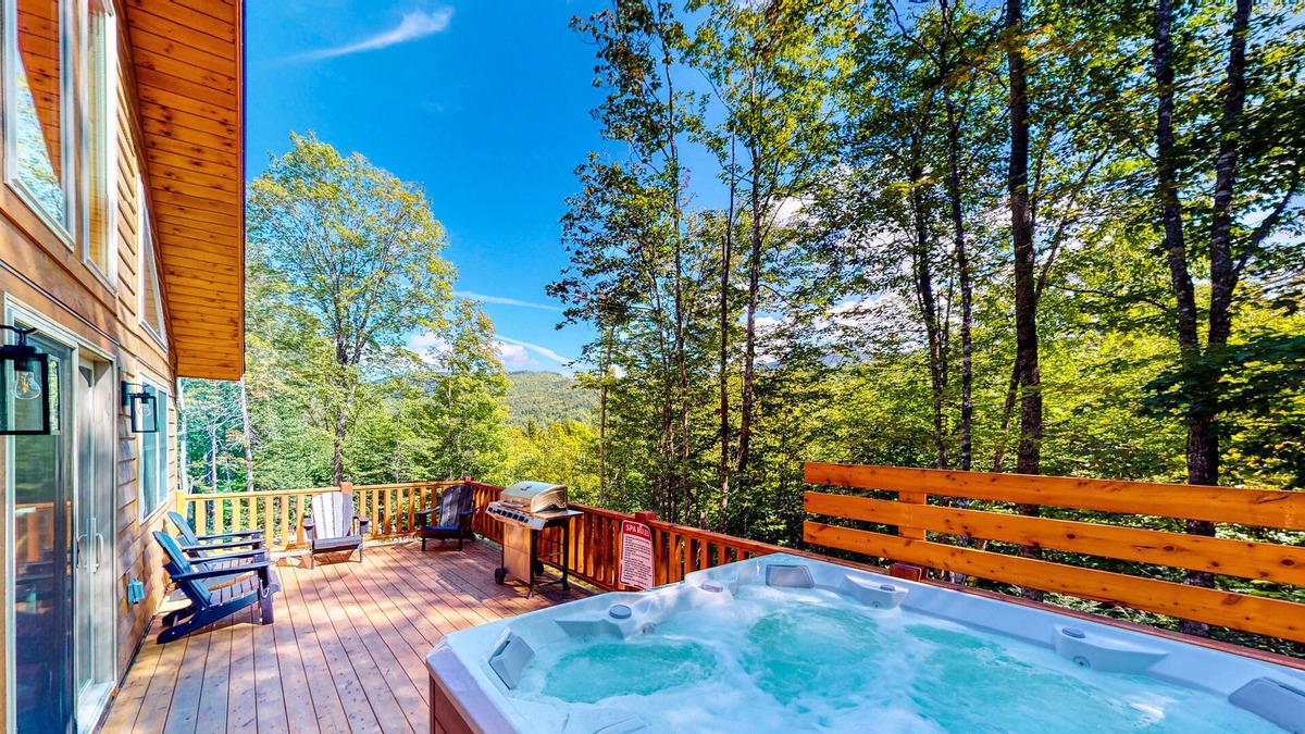 Carrabassett Valley Cabin | Gorgeous dog-friendly cabin with great view, deck, hot tub, & gas fireplace