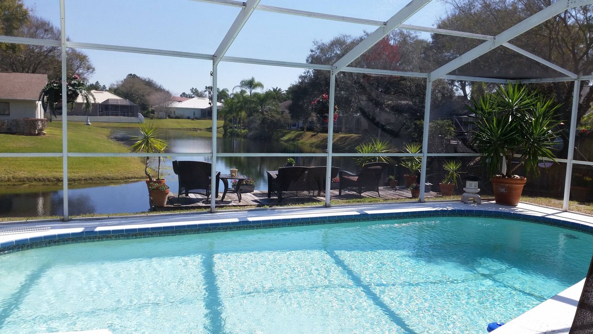 East Lake House | GORGEOUS Lakefront Pool Home with 2 Hole Putting Green, Sleeps 10 RESORT STYLE