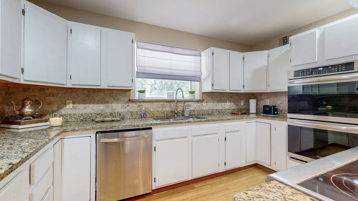 Hoyt House | Gorgeous Lakefront Home, private dock and short walk to beach