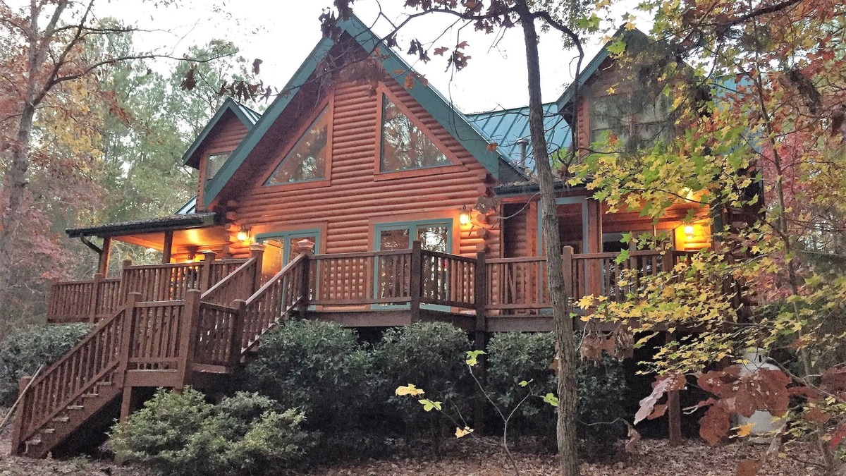 White Oak Cabin | Gorgeous lakefront log home on secluded cove with private beach and boat dock
