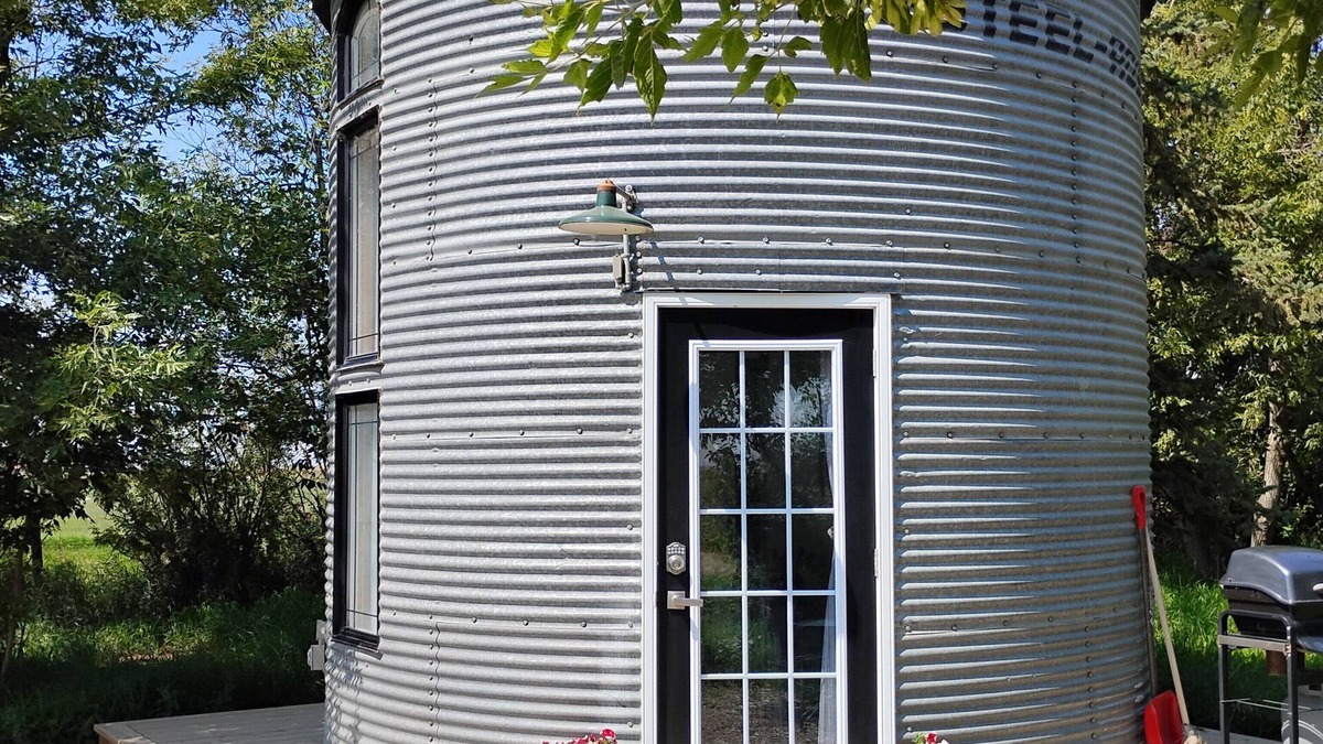 Picture Butte House | Grainbin converted into cozy house.