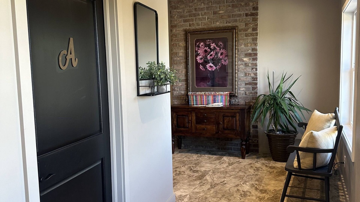 Sugarcreek Apartment | Great bedroom with private bathroom & Lounge above a local Diner