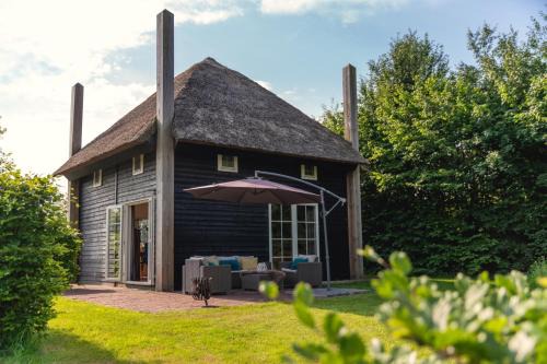 Zuna Ski Chalet | Groepsaccommodatie [2x Reggehooiberg 5p met grote achtertuin]