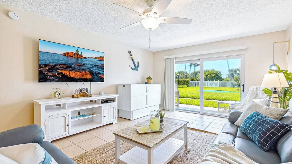 Port Canaveral Condo | Ground Floor Family Beach Escape – Pool, Patio & Walk to the Pier!