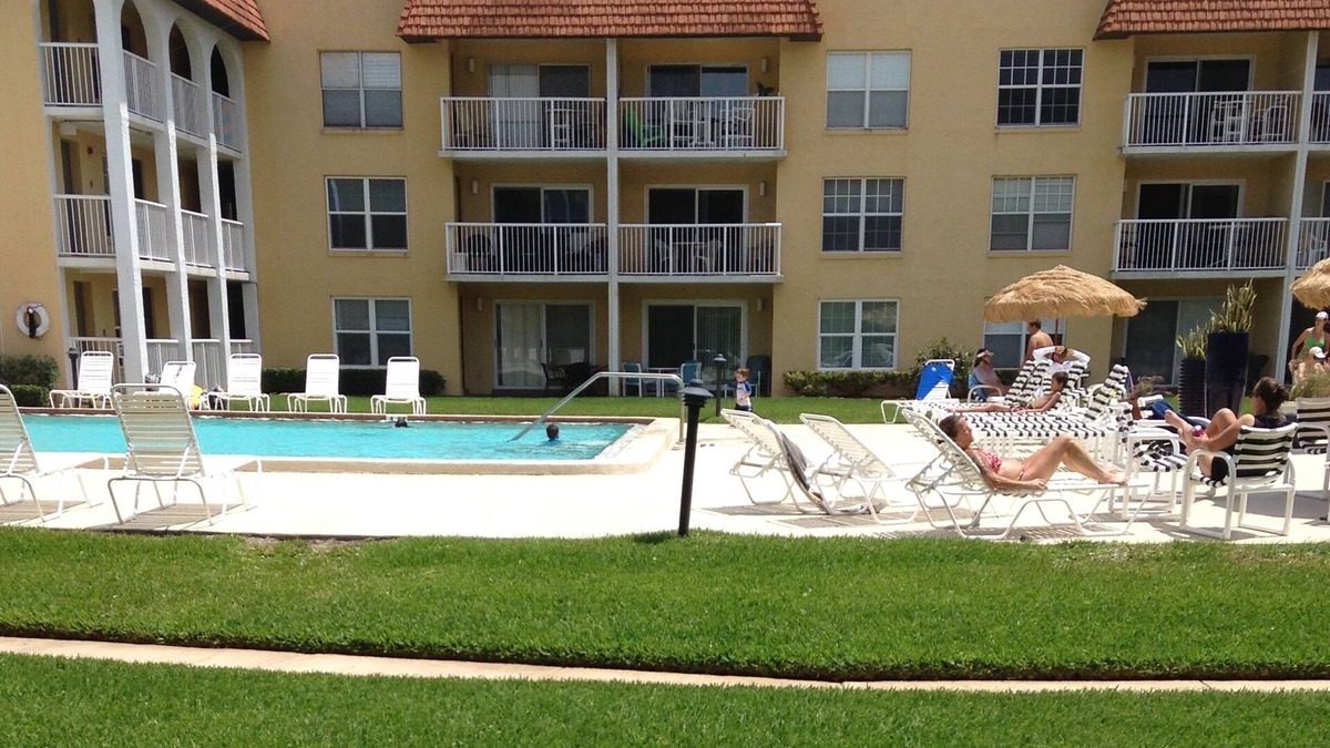 Point East Condo | Ground floor sea views - poolside on non-driving beach