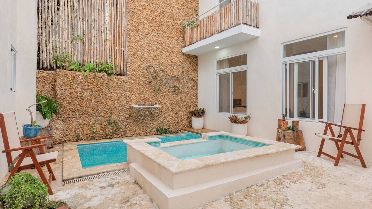 Ciudad Nueva Apartment | Guacanagarix 2-bdrm apt with ensuite baths, fully equipped kitchen and charm.