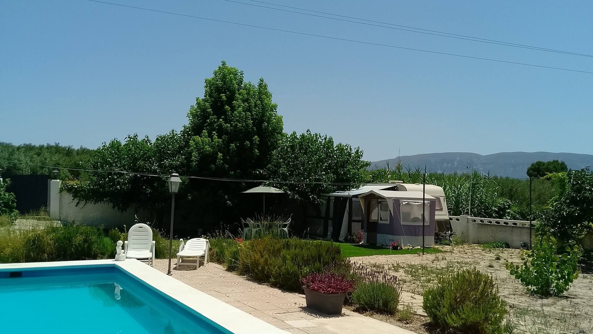 Gaianes House | guest caravan with pool