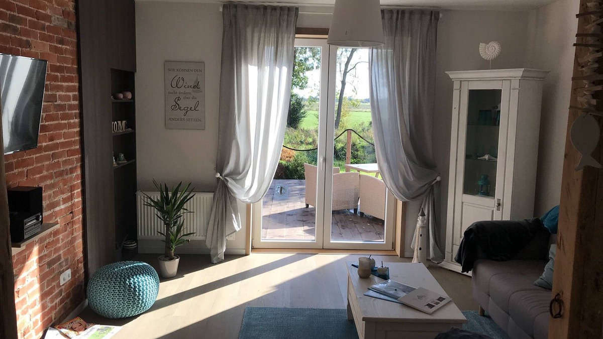 Ihlow Apartment | Gulfhof vacation apartment "Spiekeroog" on the nature reserve with a fantastic view