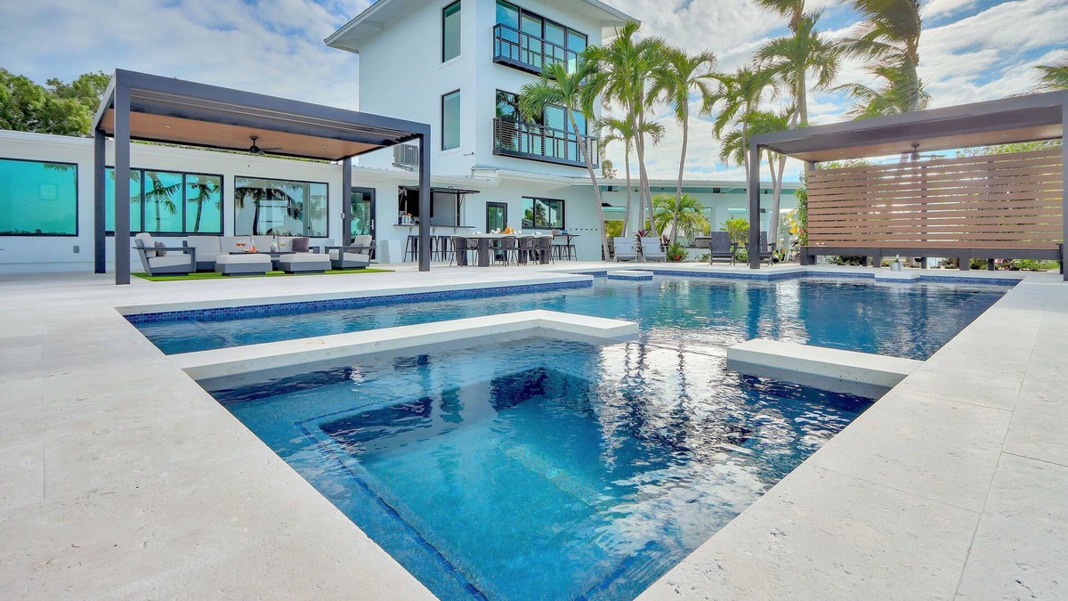 Marathon Villa | Gulfside Waterfront Luxe Estate w/private beach, pool, spa, boat dockage