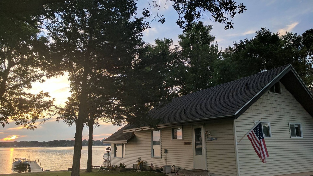 Lindstrom Cabin | Hamptons style Lake house on Sunset point. With water on both the east and west!