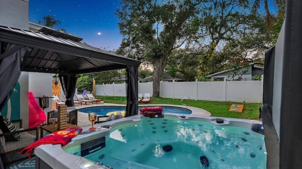 Clearwater House | Heated Pool Beach House Hot Tub, Fire Pit, Games