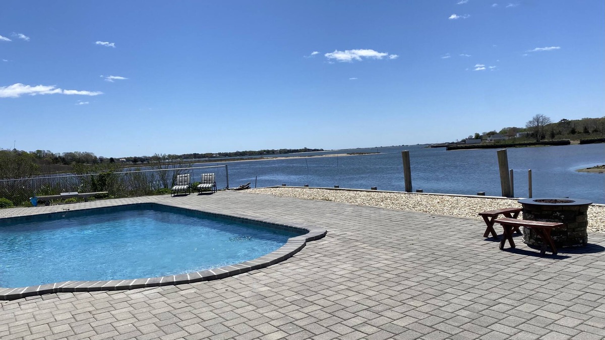 Hampton Bays House | Heated Pool & Boat Dock - Expansive Water View Family / Dog Friendly Renovated