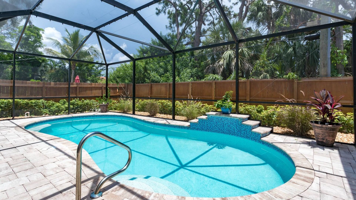 Naples Park House | Heated pool home just 19 minutes walk to Vanderbilt Beach