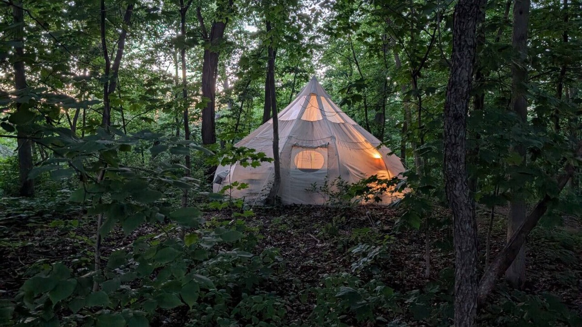 Kasbeer RV Rental | Heated Tent, Queen Bed in Forest on Farm w Animals