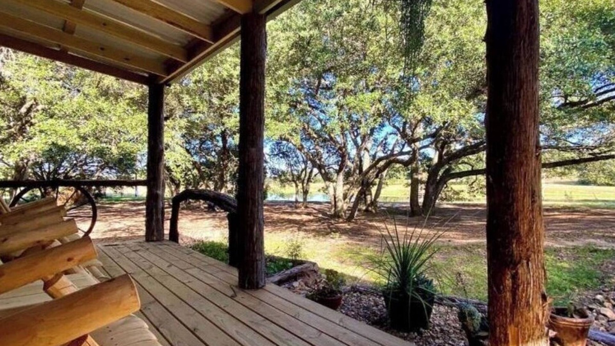 Cat Spring Cabin | Hideaway Cabin secluded & nestled in the live oaks with private outdoor Hot Tub!