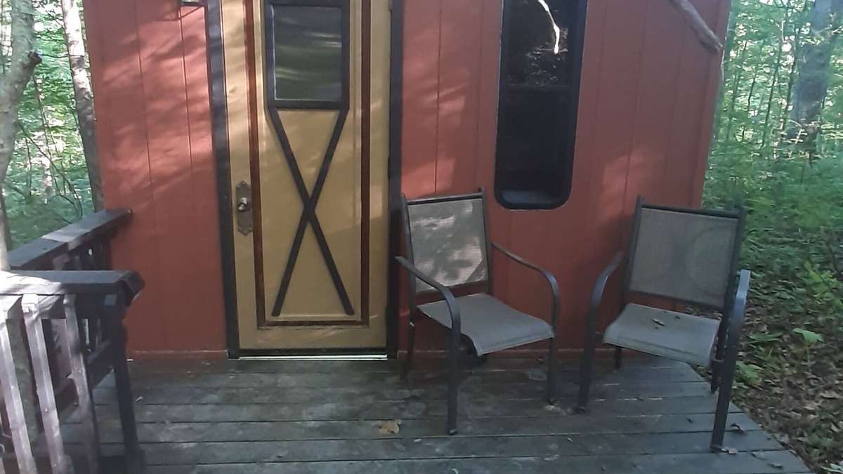 Mineralwells Cabin | Hike to your tiny cabin in the woods, we will leave the solar lights on for you.
