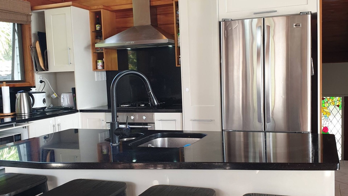 Titirangi House | Hilltop holiday home with stunning views.