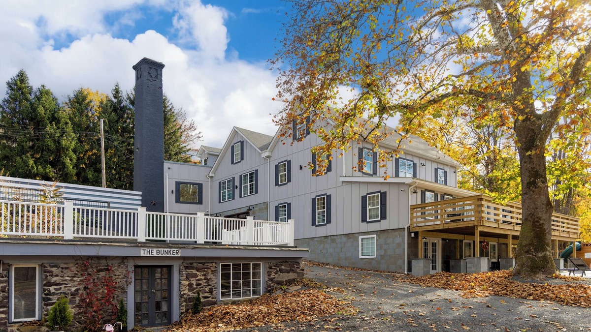 Kintnersville House | Historic Estate on a Serene Pond, Complete with Sauna, Jacuzzi, and Playground