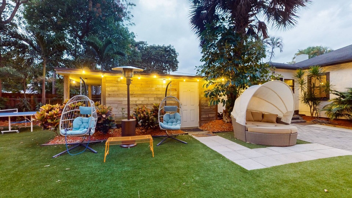 Poinciana Park House | Historic home in great locale with shared sauna, Ping-Pong, mini-golf, & grill