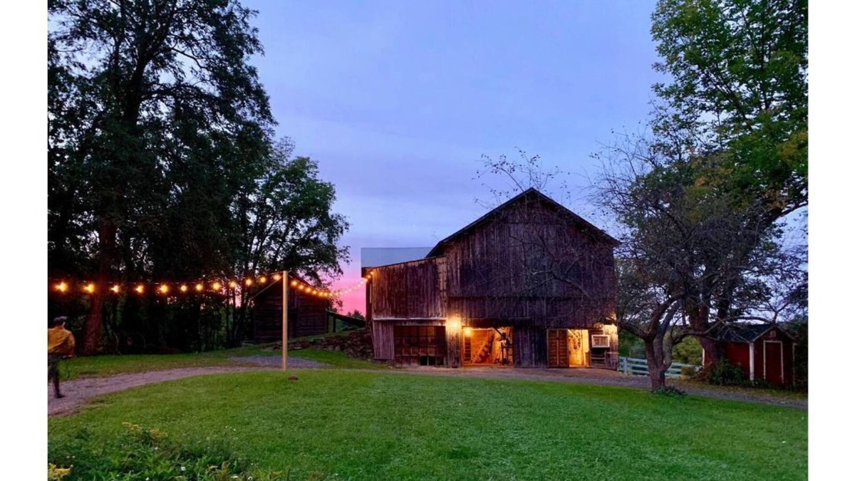 Greenville House | Historic Hudson Valley farmhouse with scenic barn and fire pit on a working farm