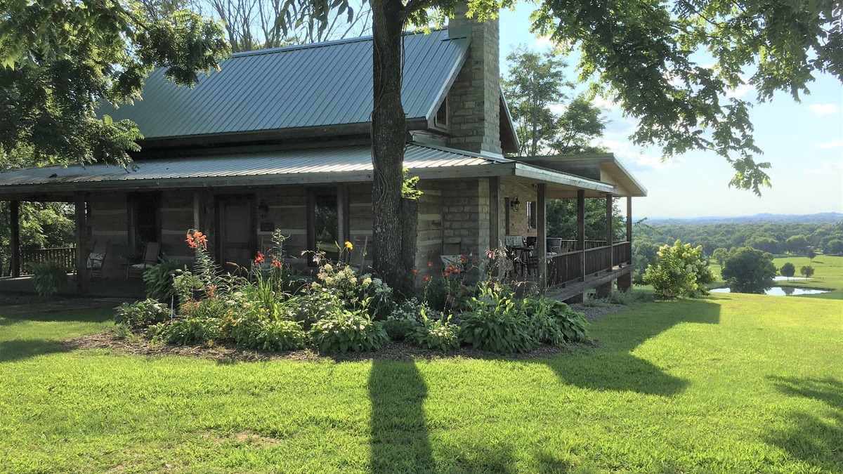 Dixon Springs Cabin | Historic Log Cabin on 200 acre farm, pasture and forest with panoramic views!