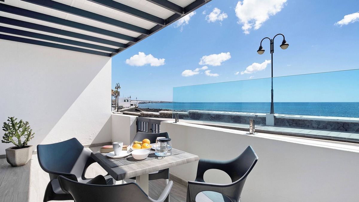 Arrieta Apartment | Holiday Apartment “Callao Beach 3” with Sea View, Terrace & Wi-Fi
